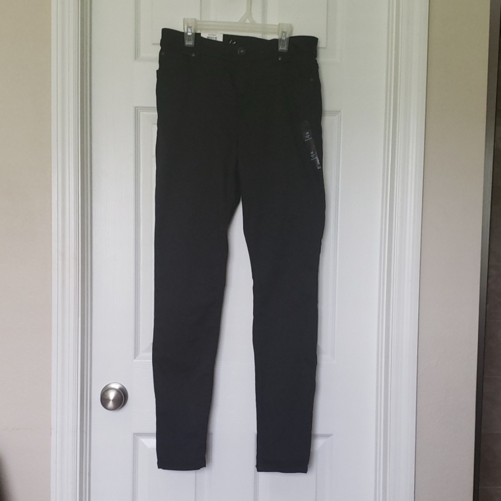 INC black stretchy skinny leg jeans, size 10.
